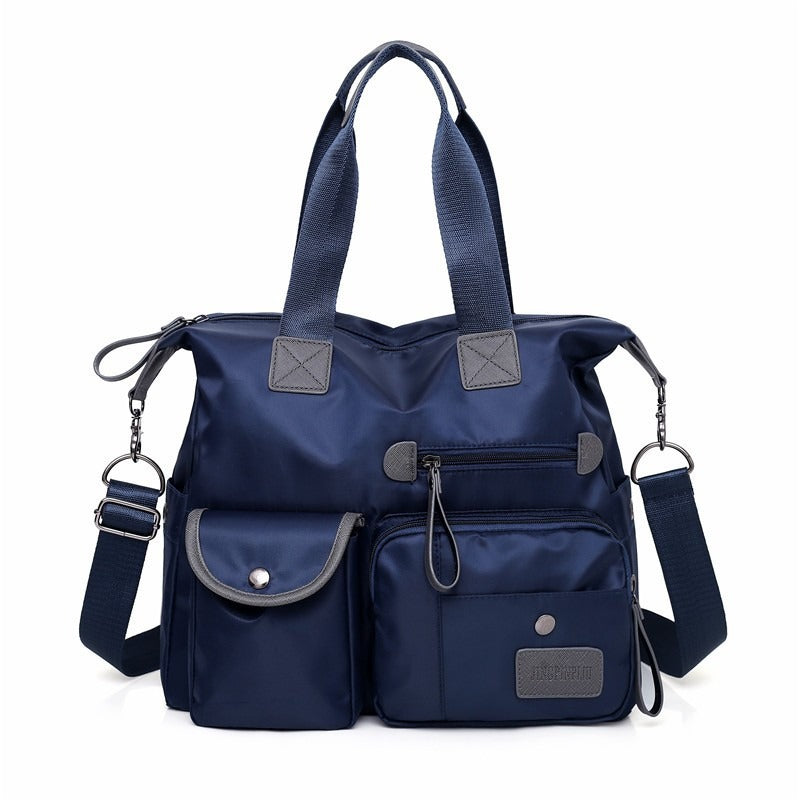 🌟 50% OFF! Large Waterproof Tote Bag – Spacious main compartment, multiple pockets & 3 carrying ways. Lightweight Oxford fabric – perfect for work, shopping & travel! 💪✨