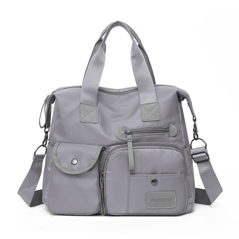 🌟 50% OFF! Large Waterproof Tote Bag – Spacious main compartment, multiple pockets & 3 carrying ways. Lightweight Oxford fabric – perfect for work, shopping & travel! 💪✨